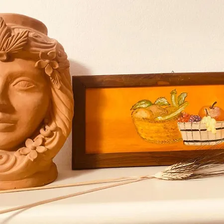 Liz House * Кальтаджироне